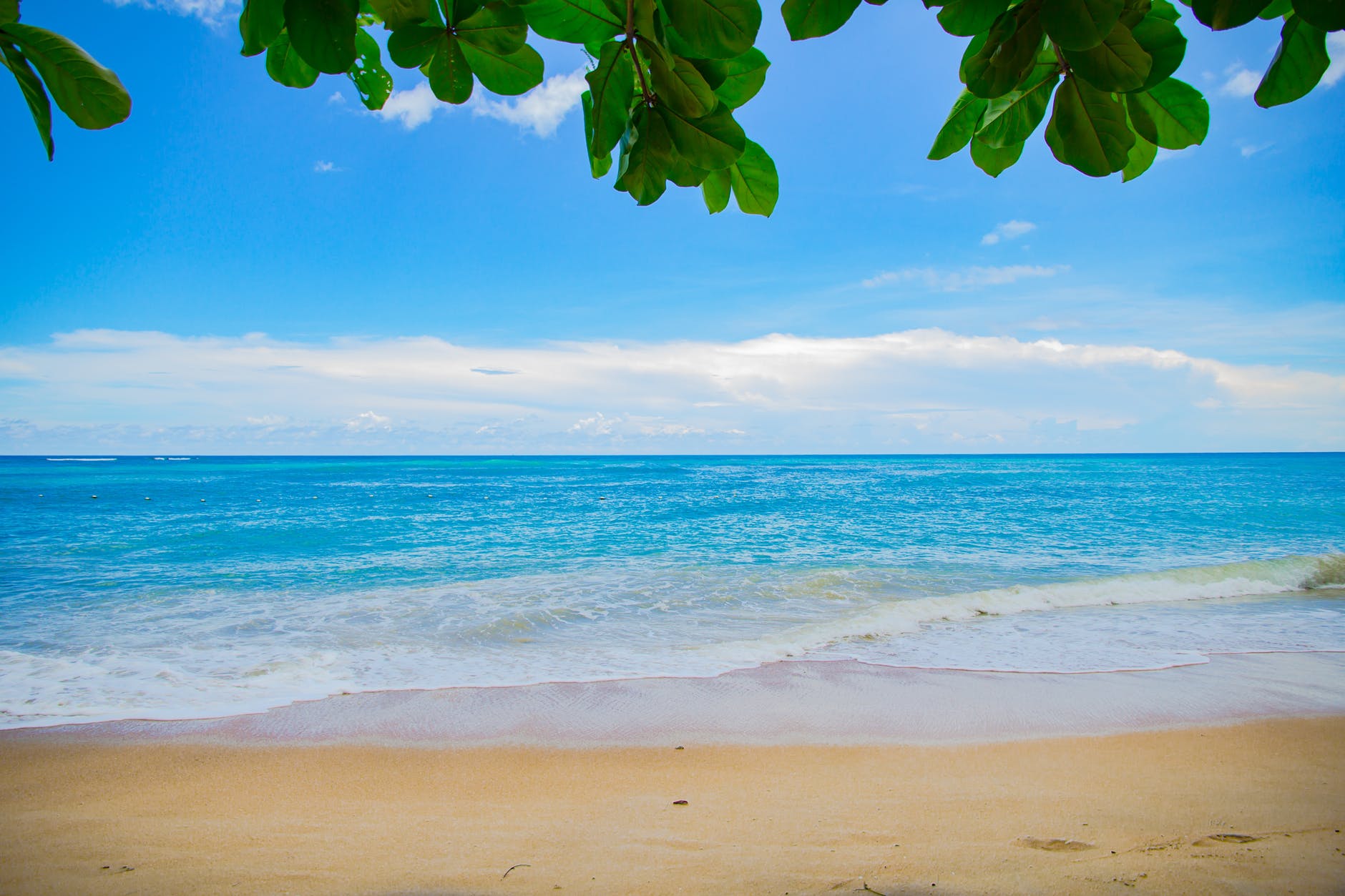 beach calm clouds horizon